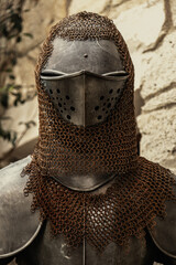 medieval knight armor and helmet close-up vertical
