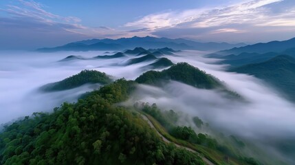 Majestic Mountain Landscape Surrounded by Serene Fog Under a Colorful Sunset Sky