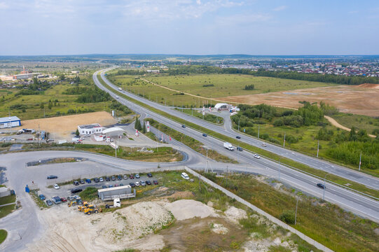 Aerial view of highway interchange. Road junction. Aerial view. Photo with noise from action camera