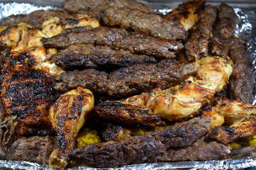 Arabian food, Traditional food beef Kofta, Kufta shish which is minced meat with Basmati rice , oriental grilled barbecued minced meat food with long yellow rice and charcoal grilled barbecued chicken