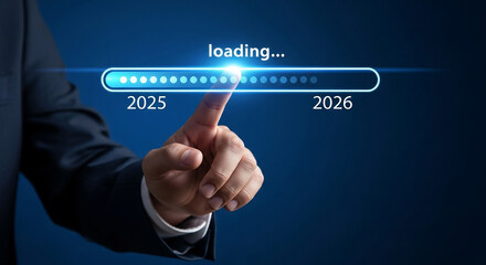 Finger touching a loading bar transitioning from 2025 to 2026 future progress