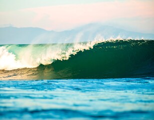 Powerful ocean wave at sunset