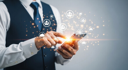 Man uses smartphone with connected people network and cloud icons on screen mobile technology