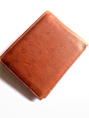 brown leather wallet isolated in white background