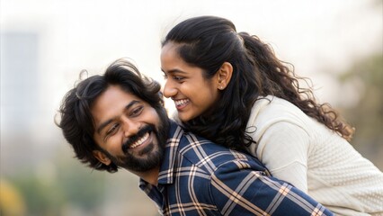 Indian couple in playful piggyback pose — sharing joy and togetherness outdoors