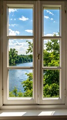 A window overlooking a river and trees
