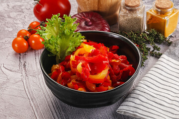 Diced raw bell red and yellow pepper