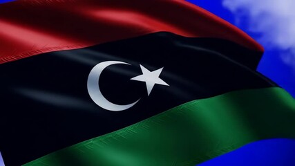 Waving Flag of Libya Against a Clear Blue Sky, The national flag of Libya in the wind