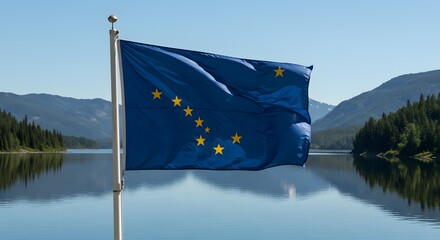 Alaska flag waving over lake