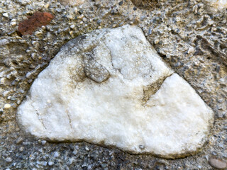 Fototapeta premium Close-up of natural stone texture with white and gray patterns