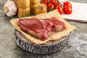 Raw marble uncooked beef steak