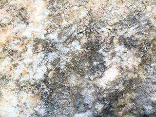 Natural stone texture with rough surface and subtle color variations