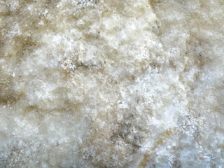 Obraz premium Close-up of rough textured white marble surface with natural patterns