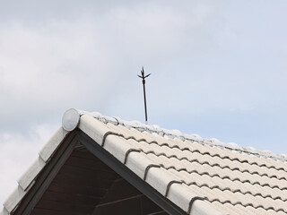Air terminal rod or Lightning rod on the roof of a building