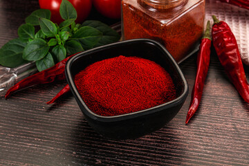 Spicy dry paprika powder in the bowl