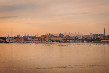 Fishing boats and coastal buildings in Taranto