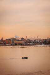Urban waterfront view in Taranto at sunset