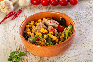 Dietary salad with canned tuna and corn