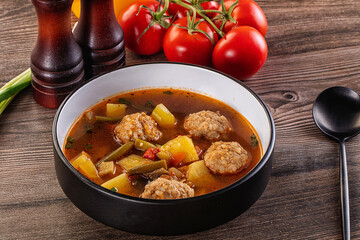 Tomato Soup with meatballs and vegetables