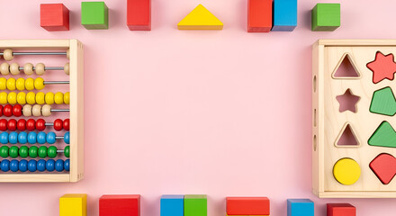 Colorful Educational Toys Frame on Pink Background - Learning and Development.