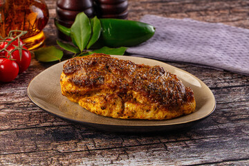 Baked chicken breast with spices and herbs