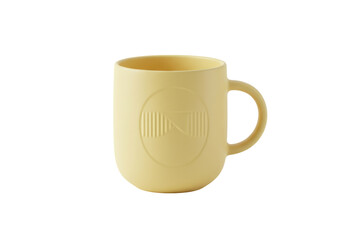 Isolated yellow ceramic coffee mug with imprinted design for hot beverage drinking