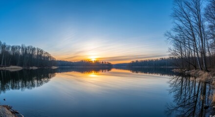 Obraz premium Tranquil Lake Reflects Golden Sunset