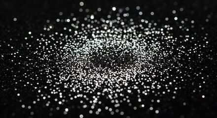 A captivating design showcasing a profusion of tiny, light-catching particles, creating a mesmerizing and elegant black background.