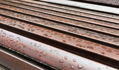 Wet Modern Bench after Rain on Water-Repellent Coating