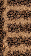 Rich soil and nutrient pellets creating textured background for agriculture or gardening projects
