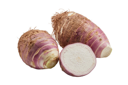 Two whole taro roots and one cross-section, showcasing their purplish-brown skin and white interior. background removed