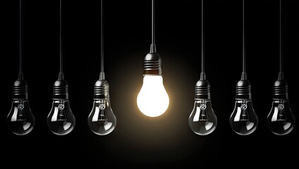 Illuminated Light Bulb Among Dark Bulbs.