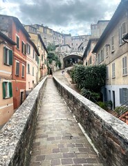 Narrow street in Siena, Tuscany, Italy