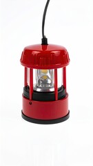 Compact red LED lantern with a protective cage, suspended by a black wire.  Features a simple, cylindrical design