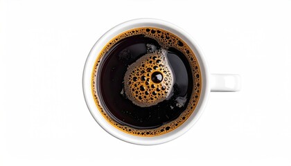 Overhead view of a filled white mug containing dark coffee with visible crema and bubbles