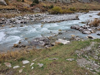 river flowing into the mountains In ala Archa National Park Kyrgyzstan 