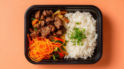Delicious beef stir-fry with colorful vegetables and rice served in a black takeout container