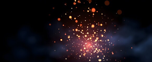 Fototapeta premium The spark dances like fireflies setting small bright glowing particles alight in darkness