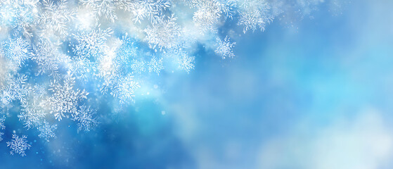 Obraz premium Close-up of frosty snowflakes with sunlight and blue sky background, winter nature scene, seasonal cold weather concept.