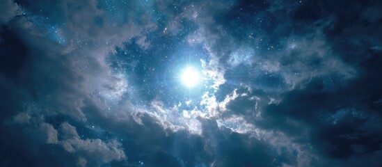 Ethereal sky with a bright central light and dramatic dark cloudscape