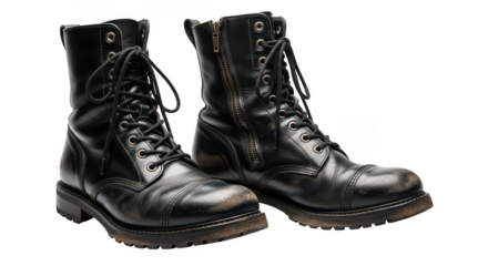 A pair of black leather work boots on transparent background