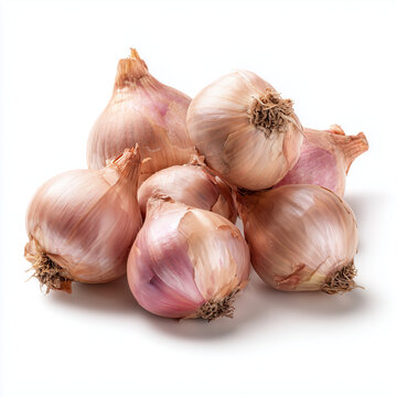 whole shallots on white background