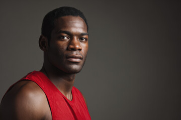 Obraz premium powerful athlete portrait showcasing determined expression that captures inner strength and focus