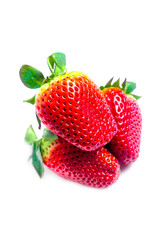 Bright red strawberries placed on a white background.