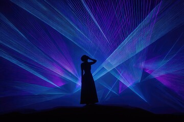 Silhouette of a Woman in a Laser Light Show.