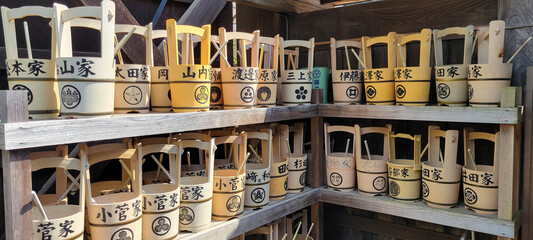 Oke, Buckets in Hongyo-ji temple in Tokyo, Japan