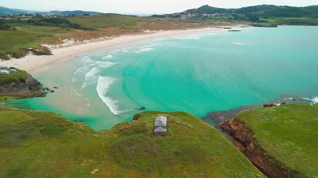 Aerial view of Playa de Santa Comba beach with turquoise sea in Galicia Spain