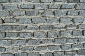 Old brick or stone wall background, concrete block background