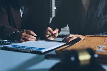 Lawyer explained to the client about the law that must be brought against the court case.