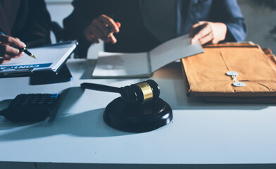 Lawyer explained to the client about the law that must be brought against the court case.